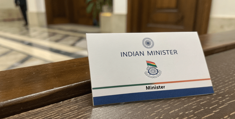 Indian minister nameplate on a wooden desk, symbolizing official contact channels for Eknath Shinde minister communication.